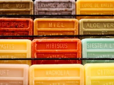 Home Colorful display of handmade aromatherapy soaps in various scents.