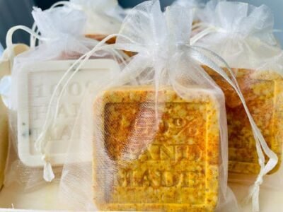 Home Beautifully handcrafted organic soaps wrapped in elegant sheer bags for a luxurious touch.